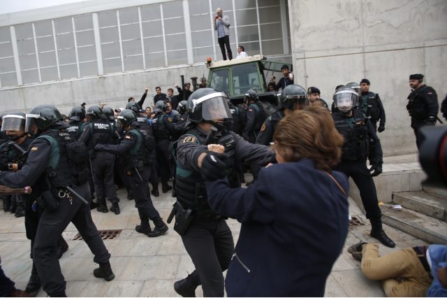 Civil guards clear people away