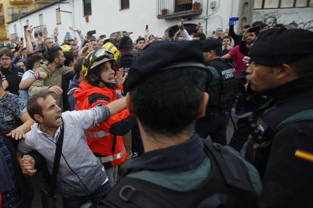 People protest in a stand off with civil guards