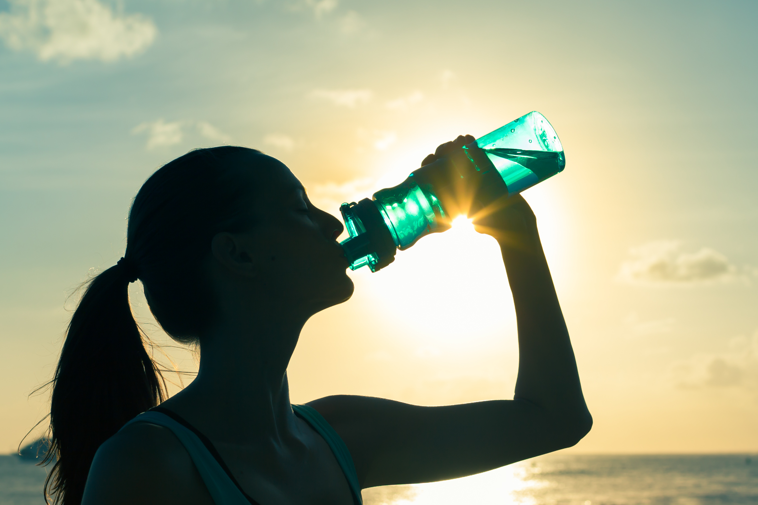 Woman drinking water (Thinkstock/PA)