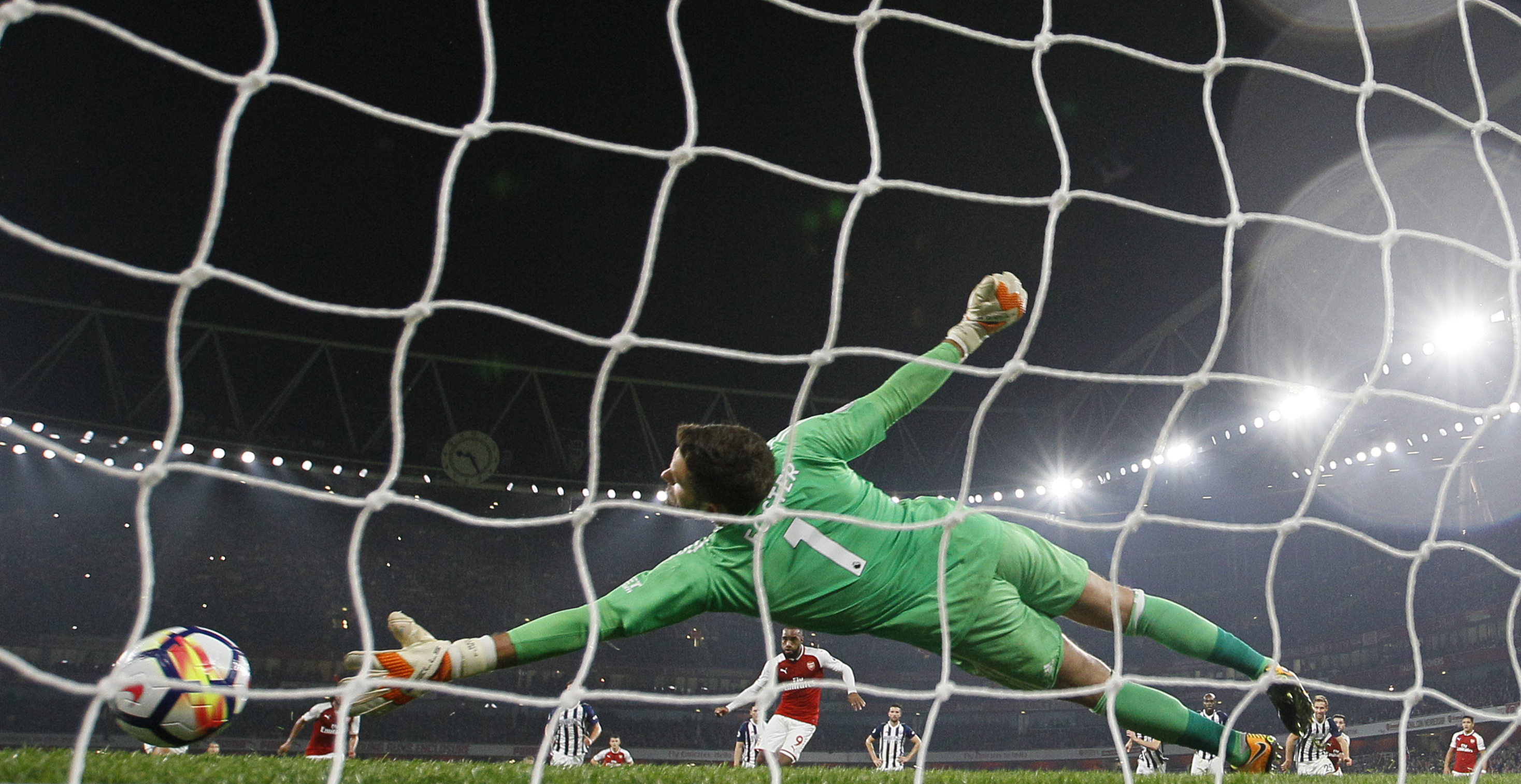 Arsenal's Alexandre Lacazette scores a penalty