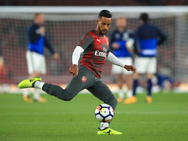Theo Walcott warming-up against West Brom