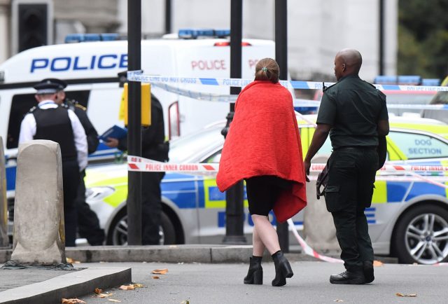 A woman is treated by emergency services