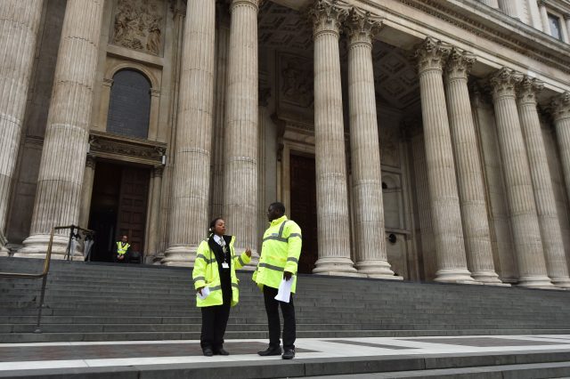 Security guards stand outside St Paul's Cathedral. (PA)