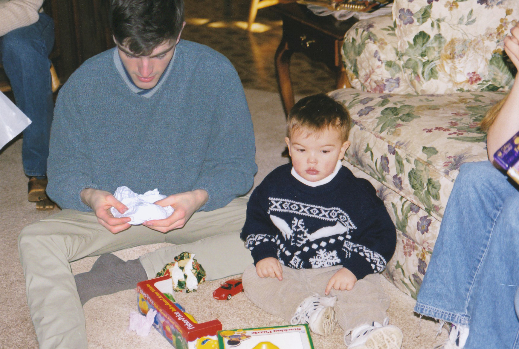 Conor and his younger self opening presents (Conor Nickerson)