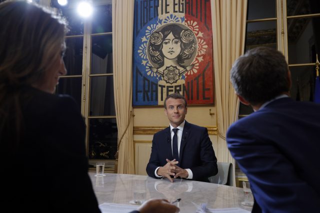 French President Emmanuel Macron is seen before his first long live television interview on prime time