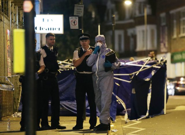 Police at the scene outside Parsons Green Tube station