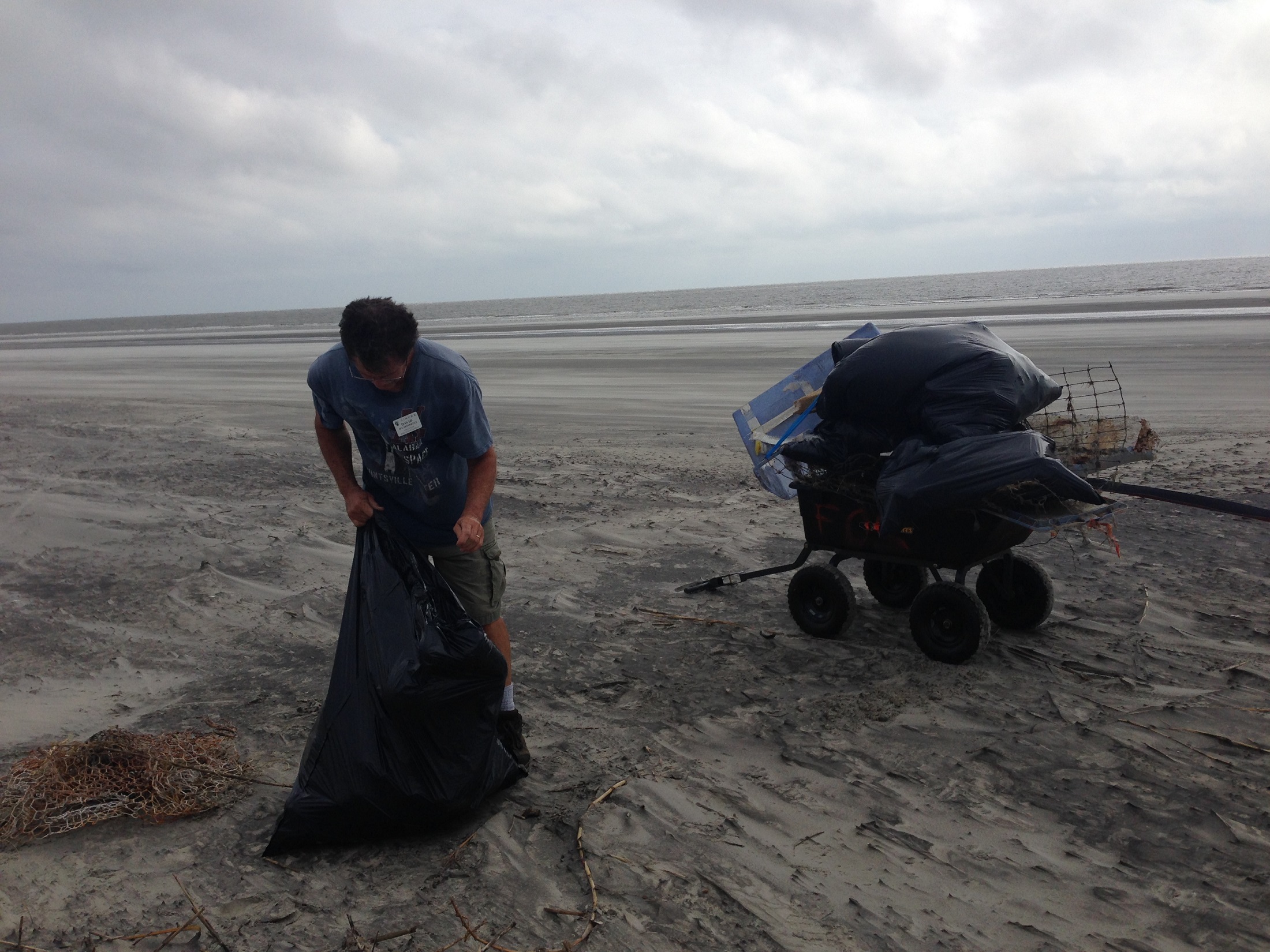 David Humphries litter picking on the beach