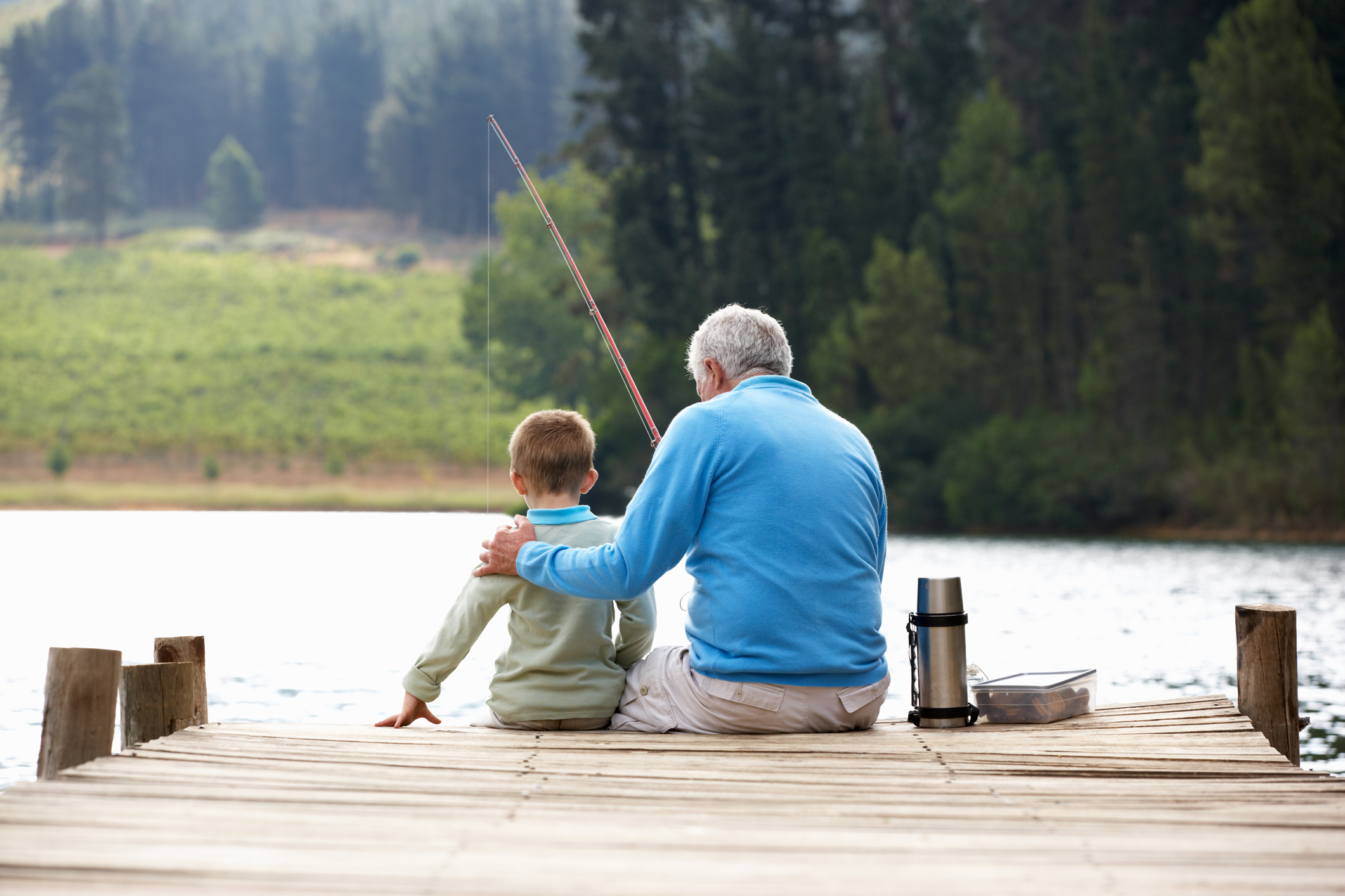 A grandad fishing with his grandson (Thinkstock/PA)