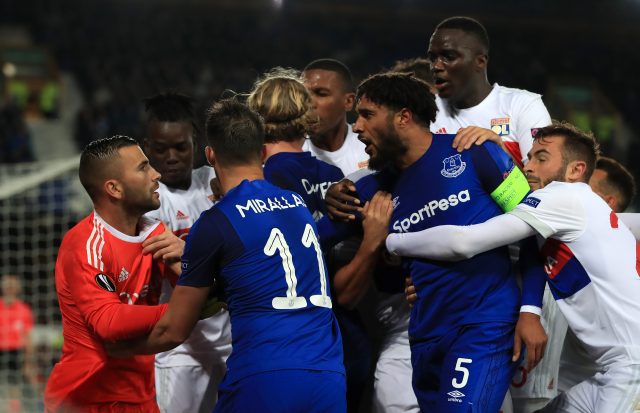 Ashley Williams (centre right) clashed with Lyon goalkeeper Anthony Lopes (Peter Byrne/PA)