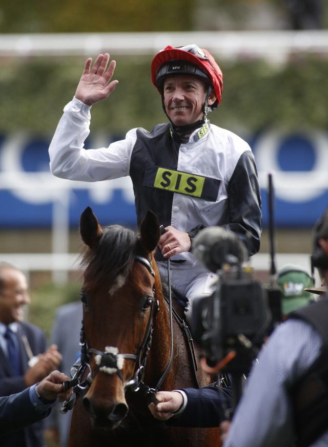 Frankie Dettori waves to the crowd after Cracksman wins at Ascot