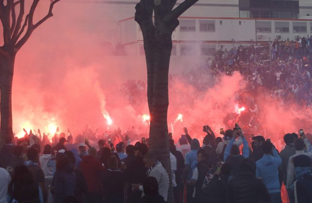 Marseille supporters demonstrate in front of the stadium before the game