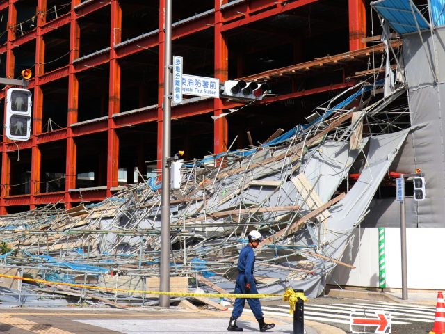 Collapsed scaffolding at a hospital in Fukuoka, southern Japan (Yoichi Ishikawa/AP)