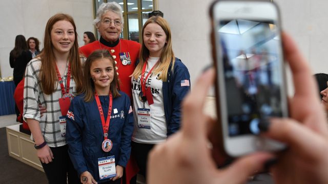 Around 100 family members, including widows, children, parents and siblings, gathered at the US embassy in London