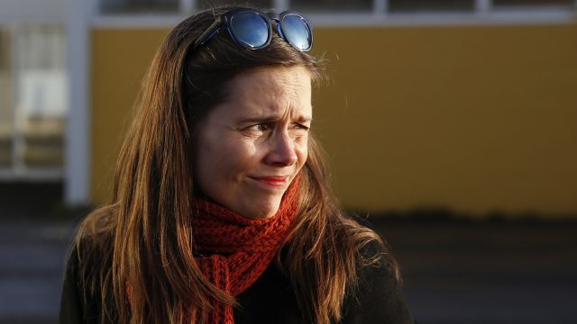 Katrin Jakobsdottir leader of the Left-Green Movement gestures as she interacts with members of the media