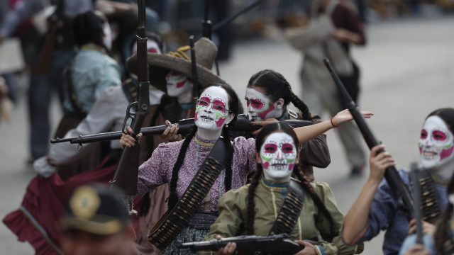 Performers participate in the Day of the Dead parade on Mexico City's main Reforma Avenue (Eduardo Verdugo/AP)