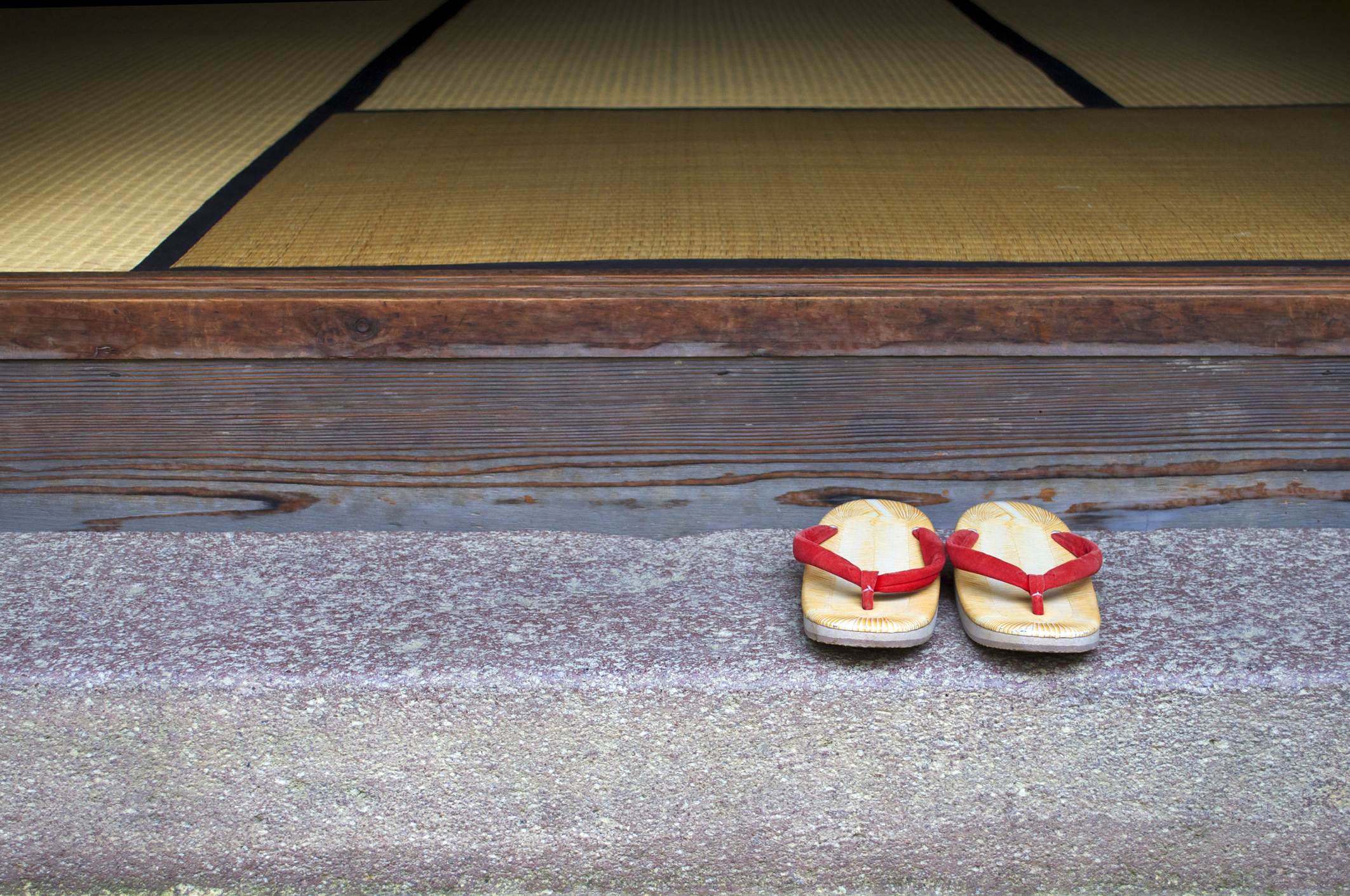 Japanese house with shoes outside 