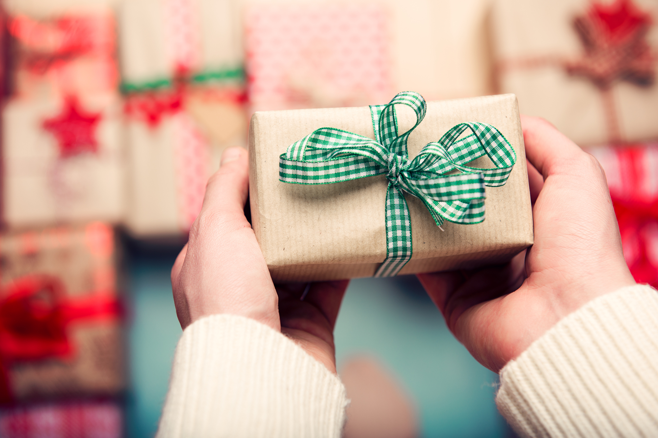 A woman holding a gift