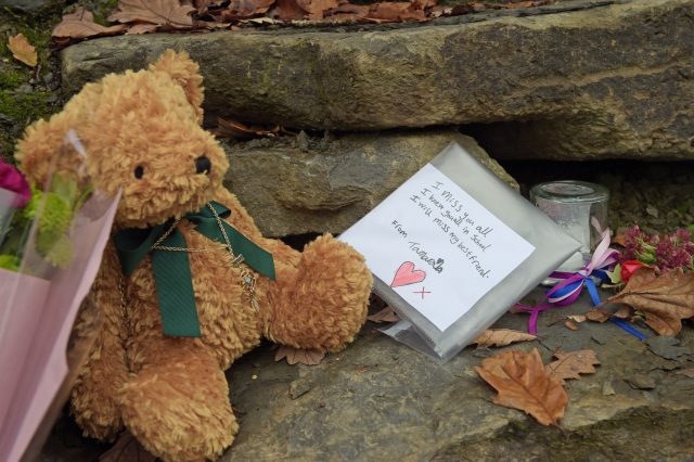 Flowers left close to the scene in Llangammarch Wells, Powys. (Ben Birchall/PA)