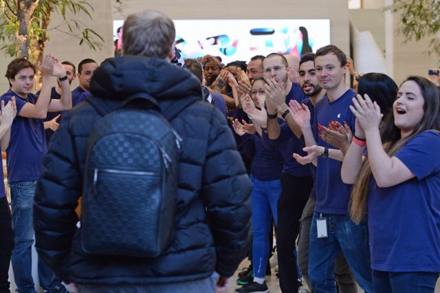 People enter the Apple Store on Regent Street 