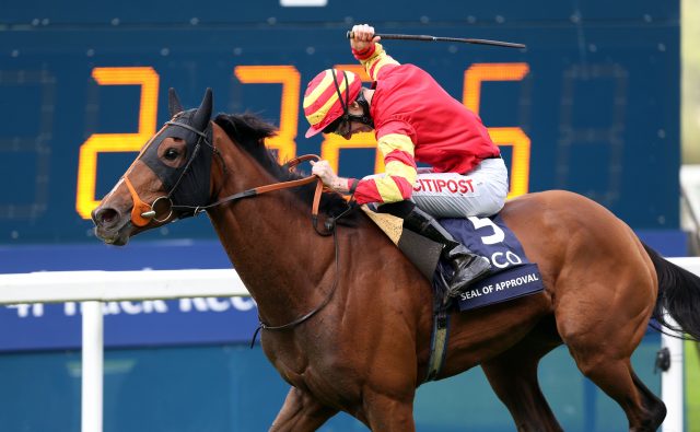 George Baker punches the air after his first Group One success with Seal Of Approval at Ascot (Steve Parsons/PA)