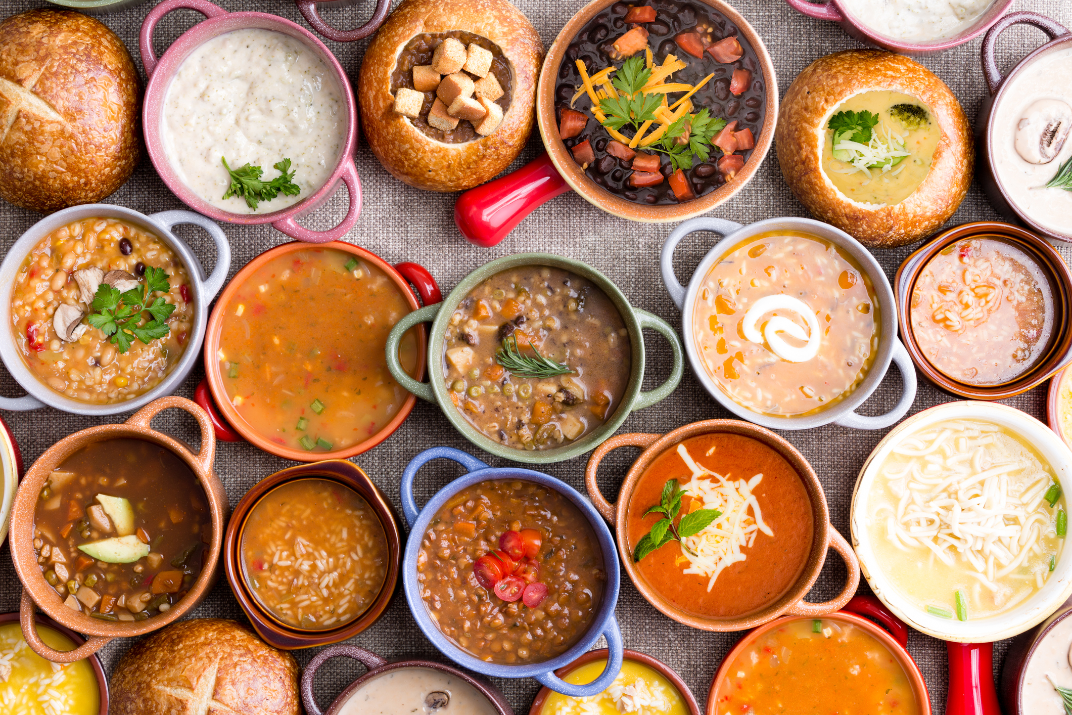 Variety of garnished soups in colourful bowls (Thinkstock/PA)
