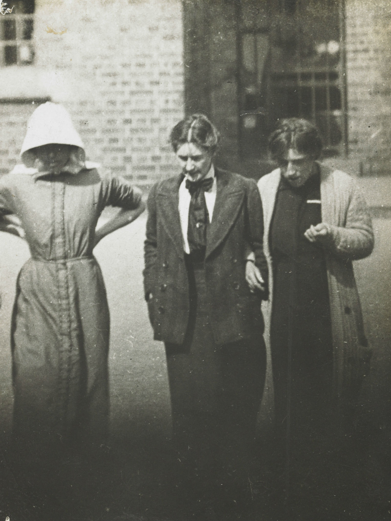 Suffragette prisoners exercise in the yard of Holloway Prison.