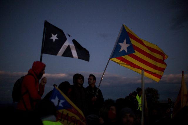 Demonstrators block a highway during a general strike in Borrassa, near Girona 