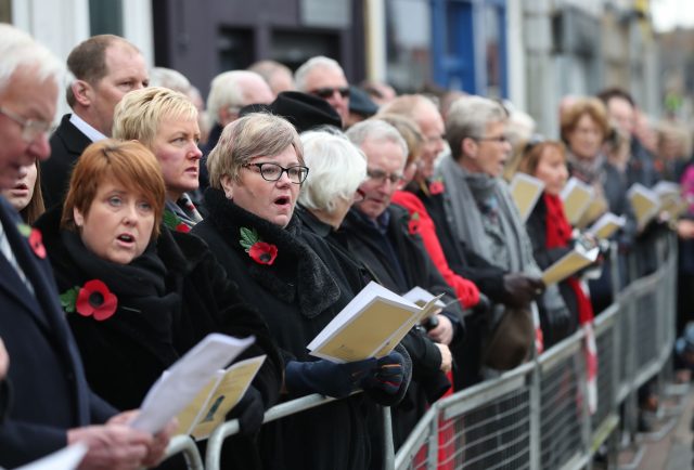 Crowds line the streets during the unveiling of the new memorial 