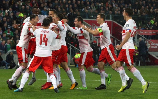 Switzerland players celebrate their goal