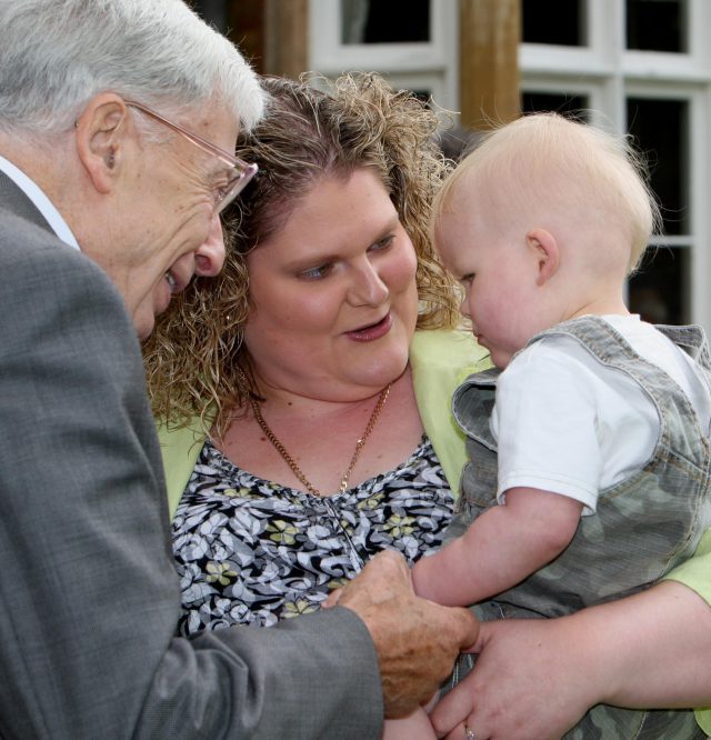 Mrs Brown introduces her son Cameron to IVF pioneer Professor Robert Edwards in 2008 (Chris Radburn/PA)