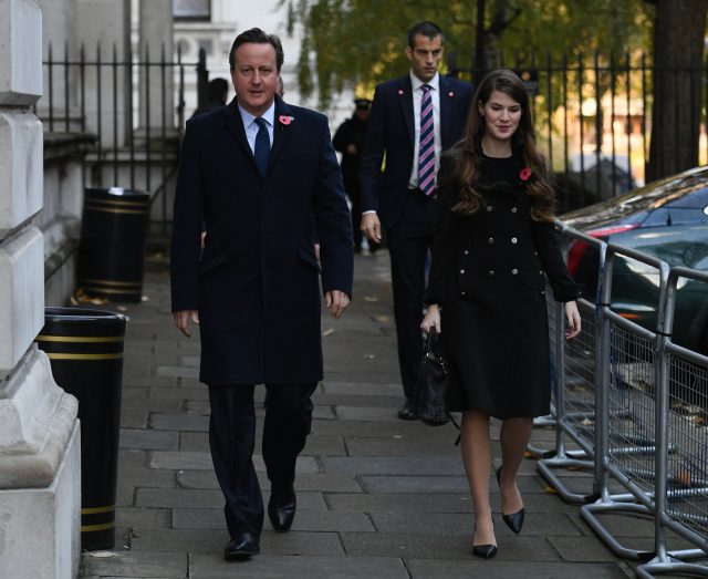 Former prime minister David Cameron walks through Downing on his way to the service Street