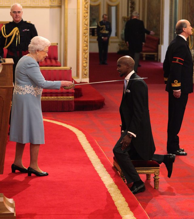 The Queen knights Sir Mohammed Farah at Buckingham Palace (Jonathan Brady/PA)