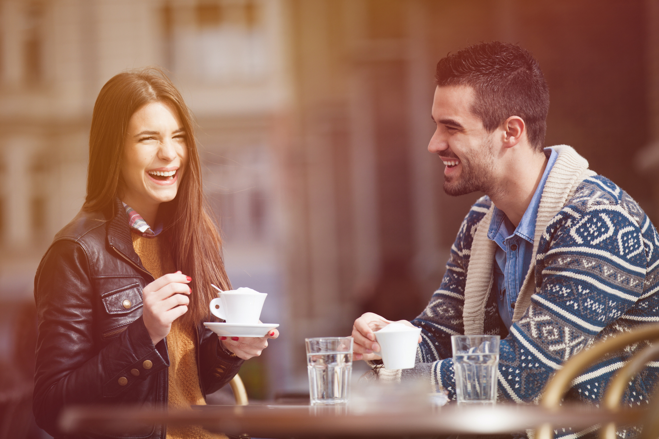 Happy young couple in a cafe