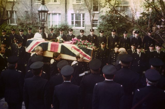 The coffin of fireman Colin Townsley is carried into St Paul's Church, Covent Garden, London