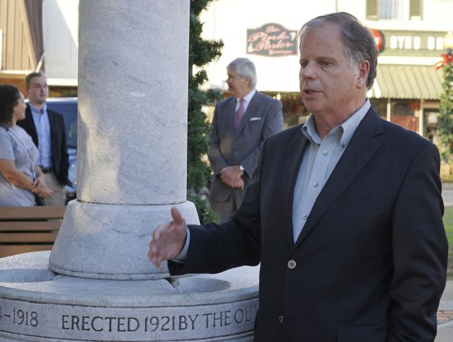 Doug Jones speaks during a campaign stop in Troy, Alabama