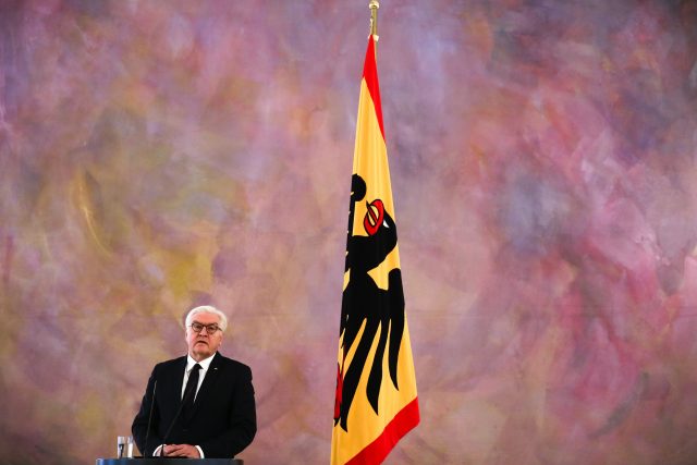 German President Frank-Walter Steinmeier briefs the media after a meeting with Angela Merkel