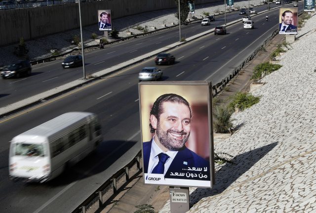 Posters showing Saad Hariri with Arabic writing that reads 