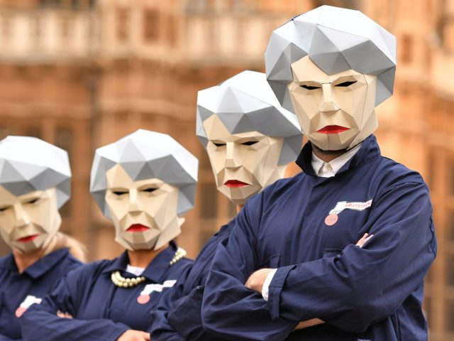 Members of the GMB union dressed as 'Maybots' protest outside Parliament ahead of the Budget 