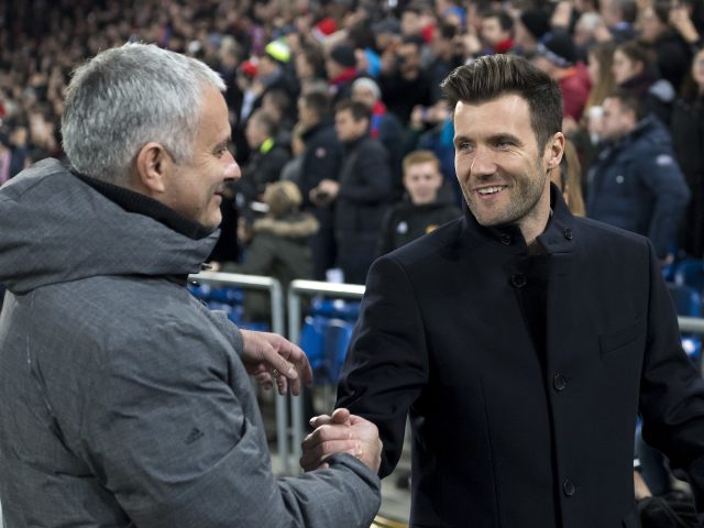 Jose Mourinho, left, and Raphael Wicky, shake hands prior to the game 
