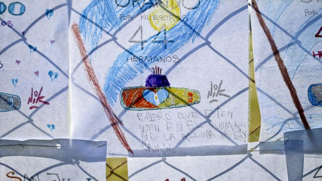 Children's drawings depicting the missing ARA San Juan submarine (Esteban Felix/AP)