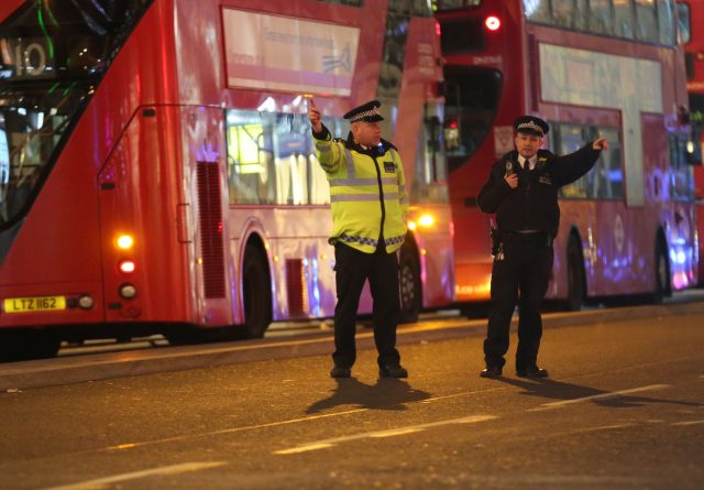 Police officers directing members of the public on Oxford Street (Isabel Infantes/PA)