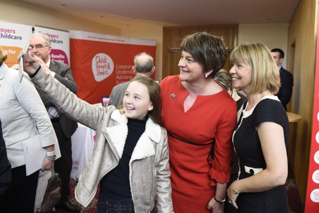 DUP leader Arlene Foster has her picture taken with supporters (Michael Cooper/PA)