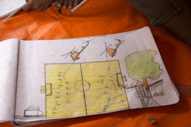A drawing made by a Rohingya refugee child from Burma showing what they witnessed before fleeing to the Batukhali refugee camp in Bangladesh