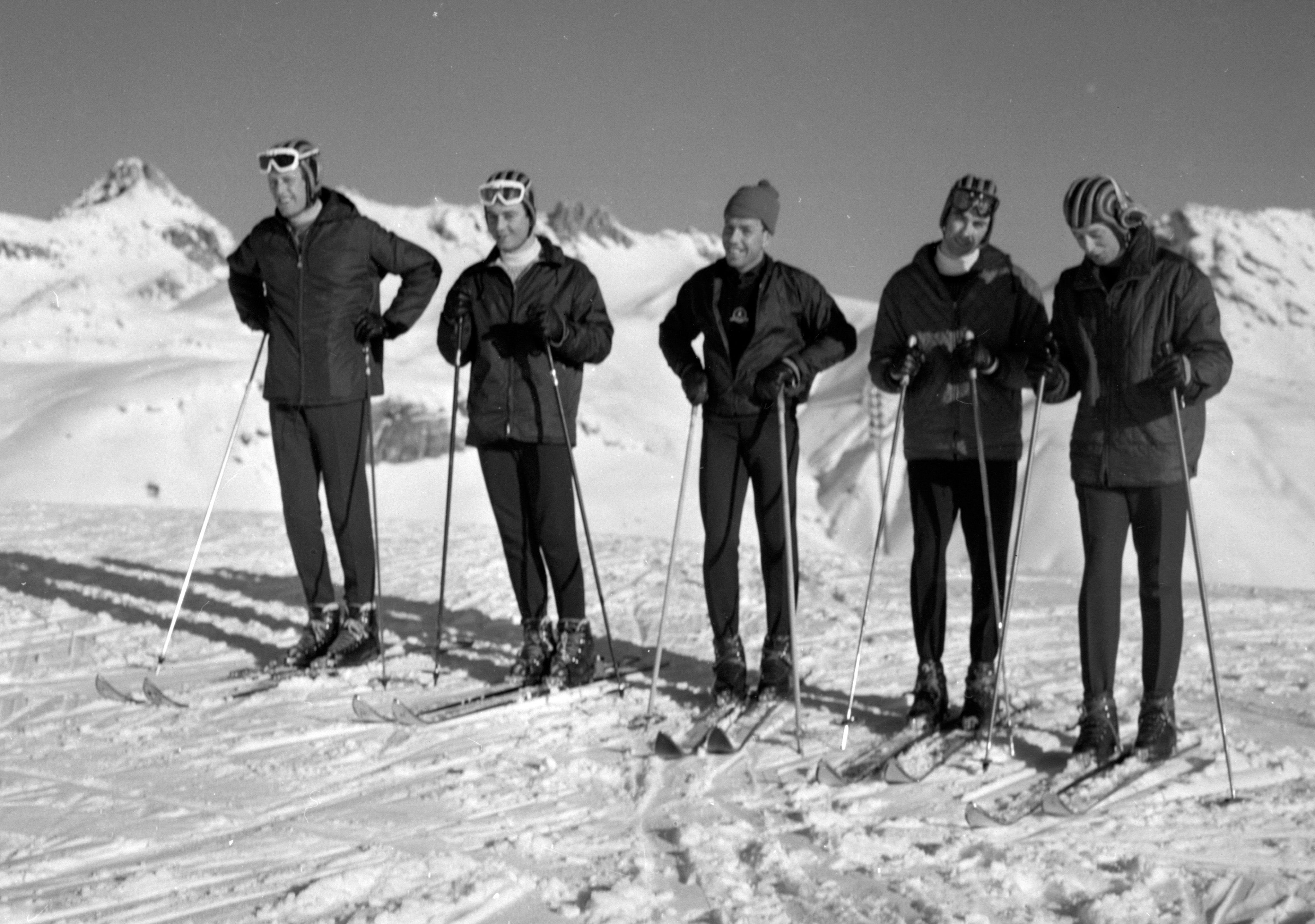 The Duke of Kent, the captain, with members of his regimental team from the Royal Scots Greys, on the Corviglia slope at St Moritz. The team are competing in the Army Ski Championships (l-r) Lieutenant Gray, Second-Lieutenant Franckenstein, the unidentified team's Swiss coach, Captain Trotter and Prince Edward, Duke of Kent.