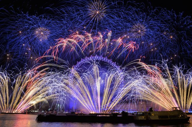 Fireworks light up the sky over the London Eye