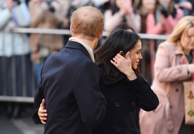 As the couple arrived, they walked towards a group of dignitaries with one arm around each other's backs  (Victoria Jones/PA)