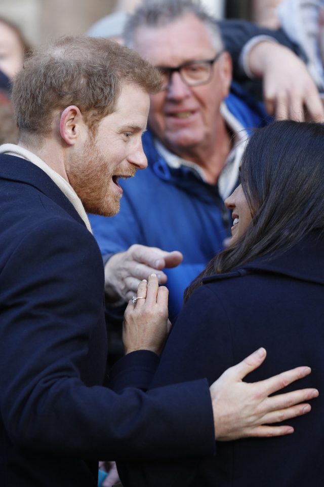 The Harry-designed engagement ring was on show as Prince Harry and Meghan Markle met well-wishers (Adrian Dennis/PA)