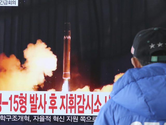 A man watches news of the latest North Korean missile launch in Seoul