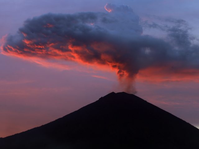 Ash clouds rise from Mount Agung in Bali