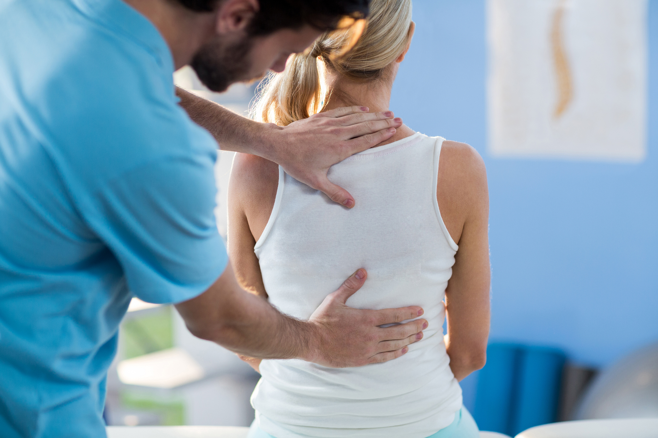 Male physiotherapist giving back massage to female patient (Thinkstock/PA)